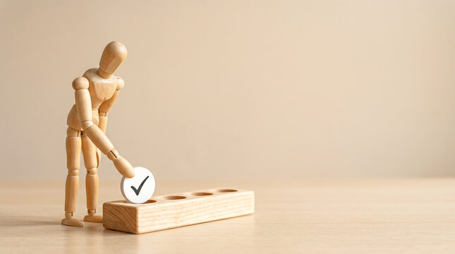 Employee evaluation and mid year performance review feedback concept with wooden mannequin inserting checkmark coin into slot block and copy space for corporate presentation website banner