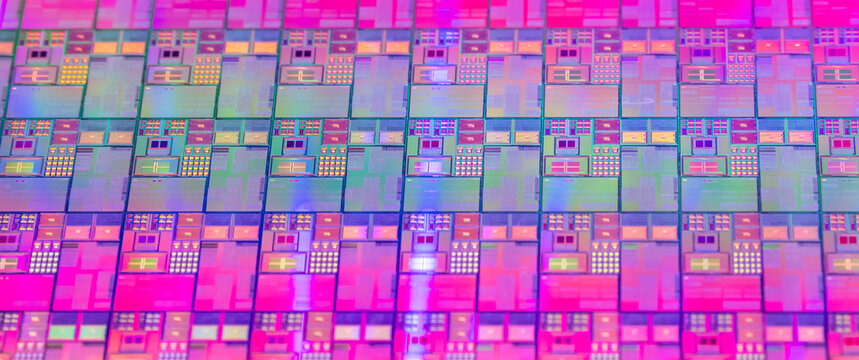 High-tech Macro Photography of a Colorful Silicon Wafer with Microchip Patterns for AI Hardware and Semiconductor Industry Concept.