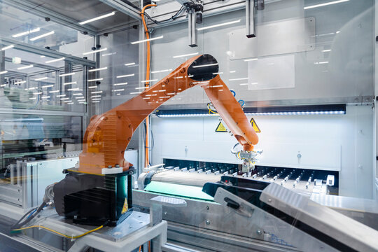 Robotic arm working in factory