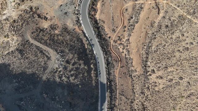Top down flight over road to viewpoint Mirador Degollada de las Yeguas on Canary Island Gran Canaria, Spain