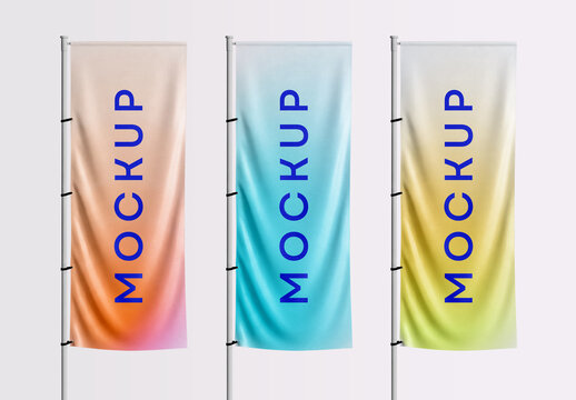 Three Flag Mockups with Colorful Gradient Designs on Poles