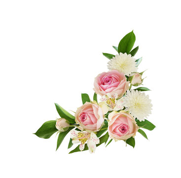 Small pink rose flowers, alstroemeria, chrysanthemums and green leaves of ruscus in a corner floral arrangement isolated on white or transparent background