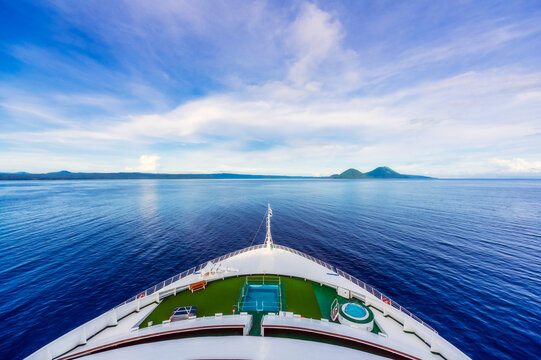 Oceania, Papua New Guinea, Island of New Britain, View of volcanoes Tavurvur and Vulcan from cruise ship