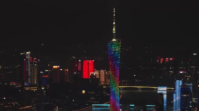 Night city skyline illuminated skyscrapers buildings, traffic over bridge. Urban landscape, twilight travel, tourism concept. Modern town drone view. Cityscape background. Futuristic architecture.