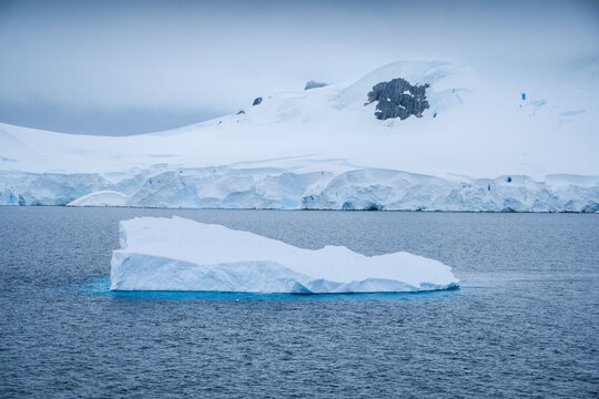 Antarctic icebergs and land ice shelves and glaciers natural geographical landscape