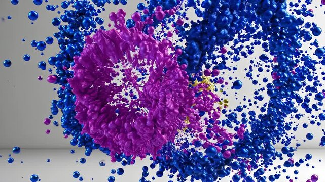 Colorful splashes of blue, pink, and yellow paint swirl and blend together in dynamic motion against a light gray background, creating an abstract visual display