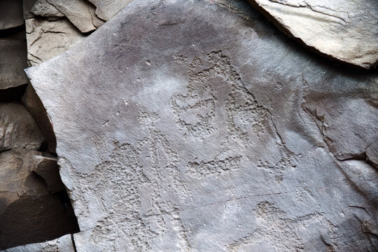 Rock art of Khakassia. Petroglyphs on Mount Chetverty Sunduk. Russia