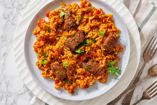 Greek Giouvetsi Rice Platter with Savory Biftekia