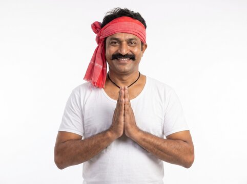 Smiling Indian Milkman Greeting with Namaste Isolated on White Background