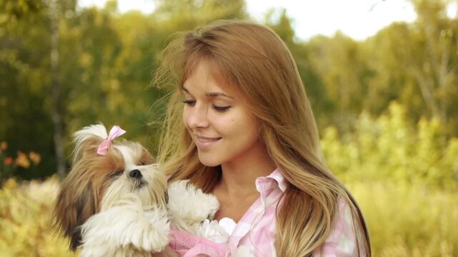 pretty young smiling woman with dog