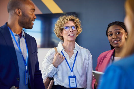 Multiethnic business team discussion during annual meeting