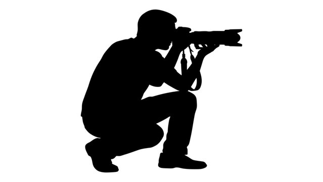 Photographer crouches while holding a camera to capture a subject in this black silhouette.