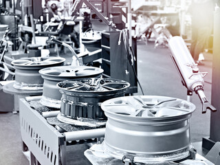 Collection of Alloy Car Wheels Displayed at Automotive Workshop © Sergey Ryzhov