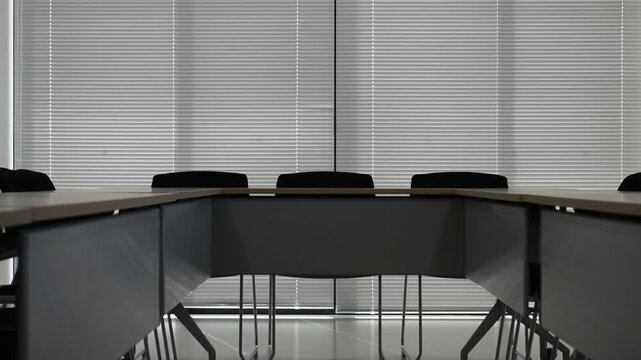 Empty Conference Room with Window Blinds and Meeting Table Interior