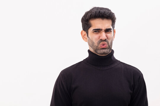 Portrait of a young man with annoying expressions