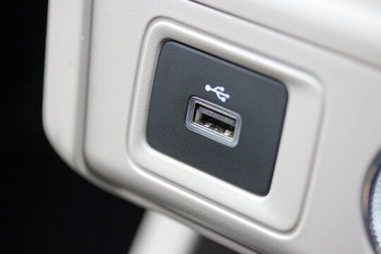 Macro of a USB outlet in a car