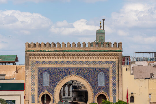 Wide View of the Blue Gate with Moroccan Flags at Bab Boujloud, Fes, Morocco