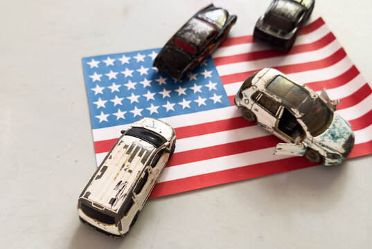 patriotic toy cars arranged on an american flag flat surface top-down perspective playful children's toys commercial natural light clean background copy space editorial educational visual.