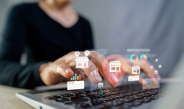 Businesswoman tracking store location, franchise expansion and local SEO marketing on laptop.