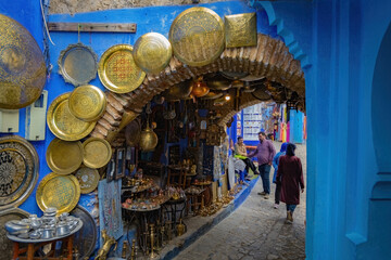 Traditional souvenir and gifts market street in blue town Chefchaouen in Moroccow © Natalia
