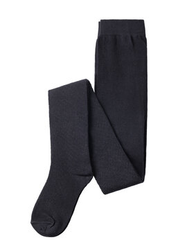 Folded kids tights black color knitted isolated on white background top view