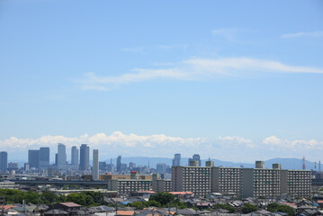 Fototapeta premium Cityscape of downtown Nagoya skyscrapers viewed from the suburbs with a residential area in the foreground.（名古屋市景観）1