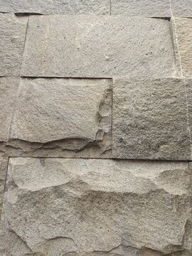 Close up of rough textured natural stone wall cladding