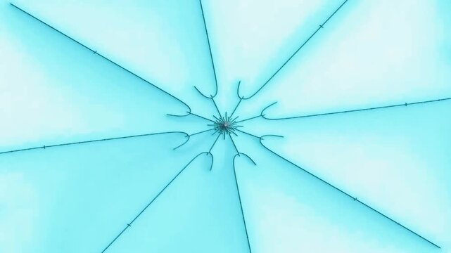 This complex digital fractal features intricate light blue branching structures that evolve into repeating spiral motifs and detailed layered symmetry with vibrant orange accents across a surface