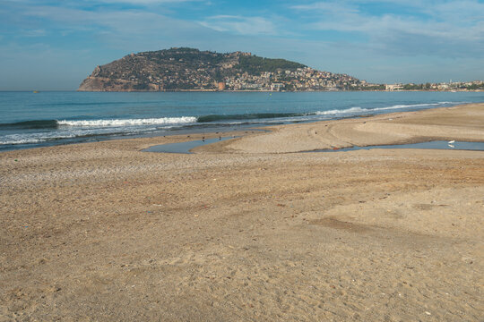 Beautiful Sandy Beach View With Famous Alanya Castle Hill In Turkey