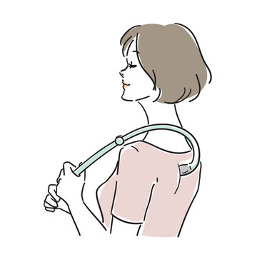 肩凝りのセルフケアをする大人の女性
