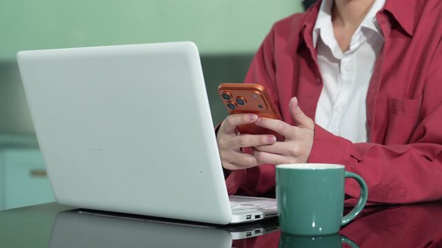 Business people working with smart phones with laptop computers with social media layouts.