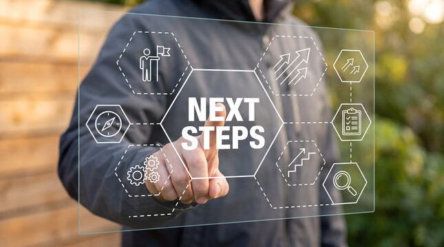 Man working on virtual touch screen presses inscription NEXT STEPS. Next steps business concept. Next step of work, plan, strategies, vision, project implementation