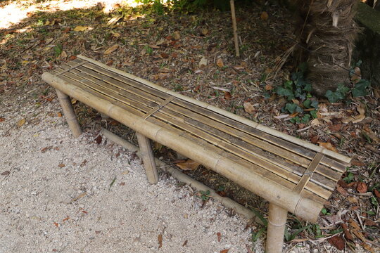 Rustic Bamboo Bench in a Natural Garden Setting