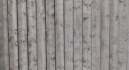 Fototapeta premium Weathered Gray Wooden Plank Wall Background with Rustic Texture