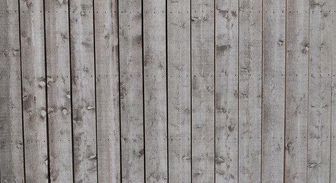 Weathered Gray Wooden Plank Wall Background with Rustic Texture