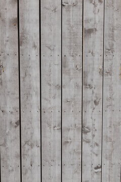 Weathered Gray Wooden Plank Wall Background with Rustic Texture