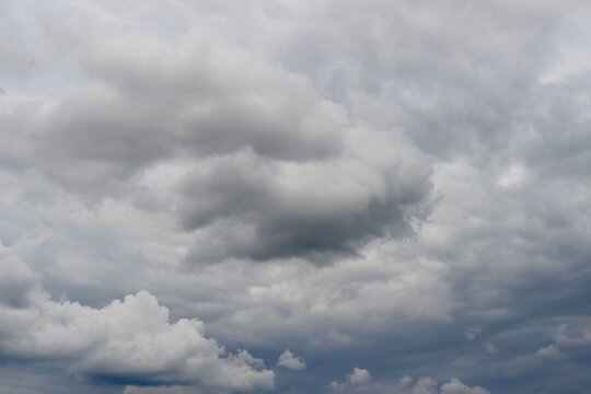 The white and gray clouds in the sky.