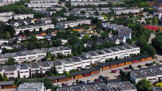Modern Residential Estate Suburb Aerial View Real Estate Development Houses. High angle drone shot of a contemporary suburban housing development district 