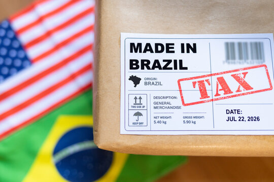 Package labeled &ldquo;Made in Brazil&rdquo; with a tax stamp and blurred Brazilian and U.S. flags, representing tariffs on Brazilian exports to the United States.