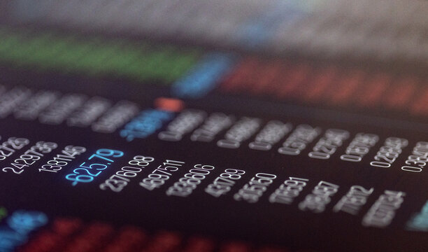 Close-up trading board, stock market data on a laptop computer screen, bid and ask prices. Stock exchange, investment strategy, prices and changes, quotes, trading volume, equity data, up and down.