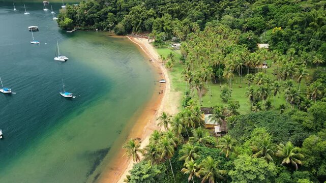 Boats anchored in a calm bay. Ilha Grande, Brazil