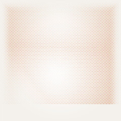 Obraz premium Abstract halftone pattern with fading orange dots on a light background