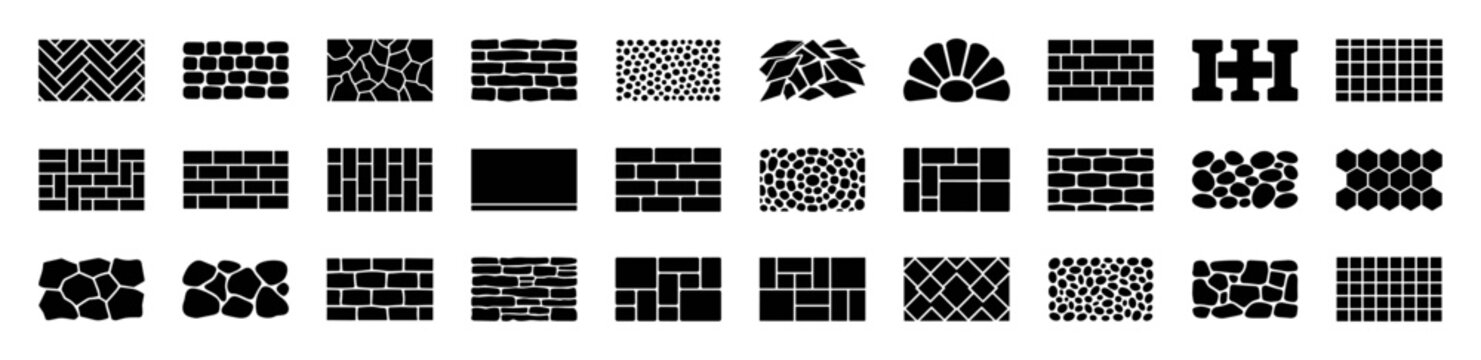 Collection of various black and white stone and brick wall pattern icons in different styles and arrangements on transparent background