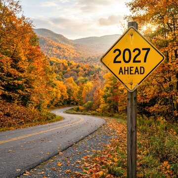 2027 Ahead Road Sign on Winding Autumn Mountain Road.