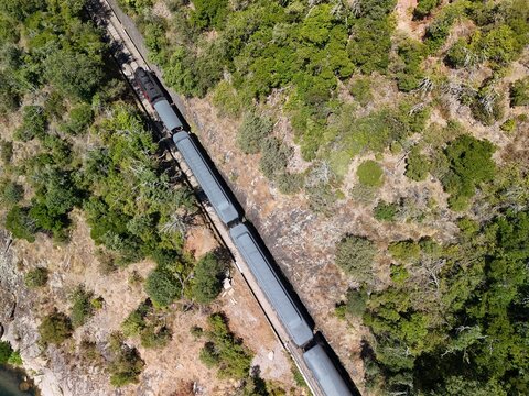 Aerial View of Historic Steam Train Through the C&eacute;vennes Forest near Anduze, France