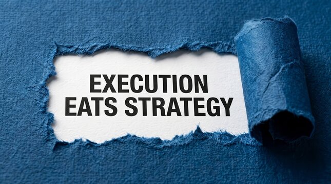Business wisdom concept featuring execution eats strategy on white paper inside a torn blue background.