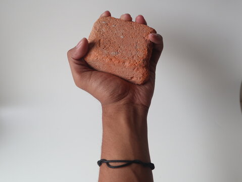 hand holding a rock
