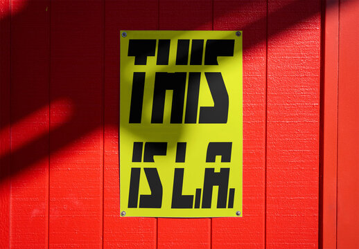 Mockup of blue Poster in red wall in Los Angeles