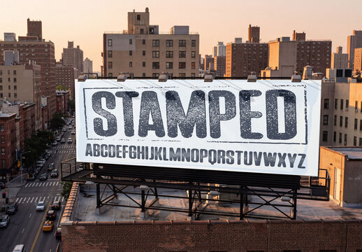Mockup of A large empty billboard stands on a rooftop in New York City.