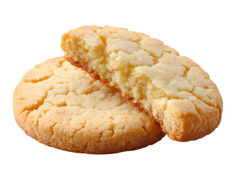 Classic sugar cookies with one broken open to reveal a soft, buttery crumb, isolated on a white background.